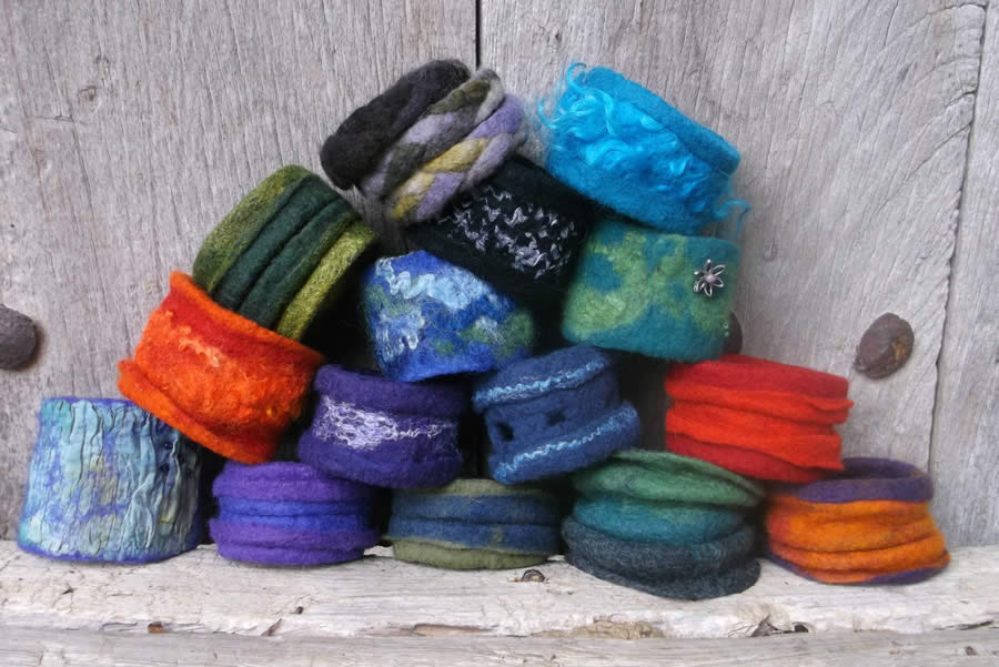 Handmade felt bracelets with silk fibers and fabrics, natural sheep curls (... not perm) in many cheerful colours